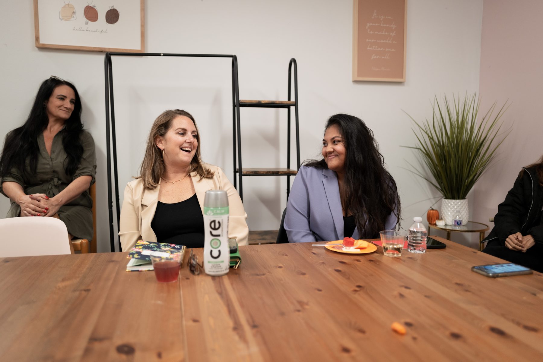 Women working together at the EmpowHERment coworking space